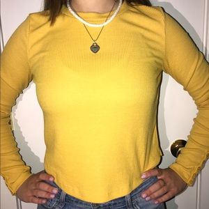 Yellow long sleeve shirt